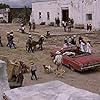 Warren Oates and Isela Vega in Bring Me the Head of Alfredo Garcia (1974)