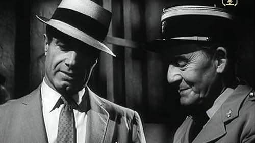 Charles Korvin and Henry Oscar in Interpol Calling (1959)