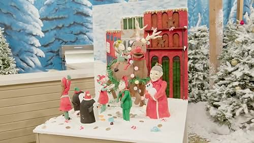 Teams compete to create holiday themed displays out of cake and sugar.