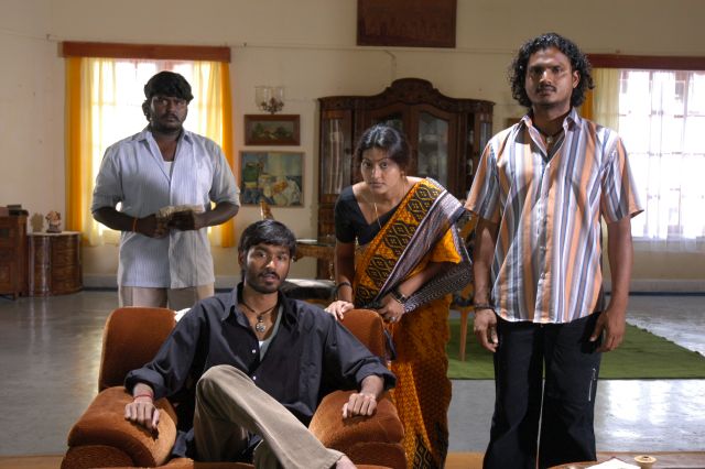 Sneha, Dhanush, and Nitish in Pudhu Pettai (2006)