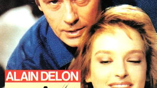 Alain Delon and Ingrid Held in Cinéma (1988)