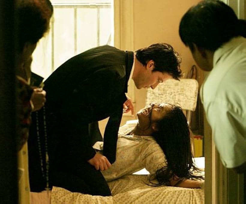 Keanu Reeves and Jhoanna Trias in Constantine (2005)