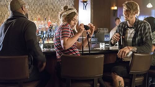 Colson Baker and Imogen Poots in Roadies (2016)