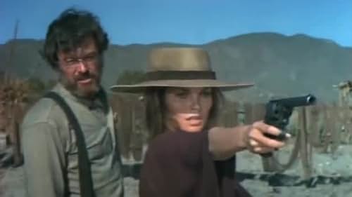 After she is raped and her husband murdered, a woman hires a bounty hunter to instruct her in the use of a gun so she can get her revenge on the three outlaws responsible.