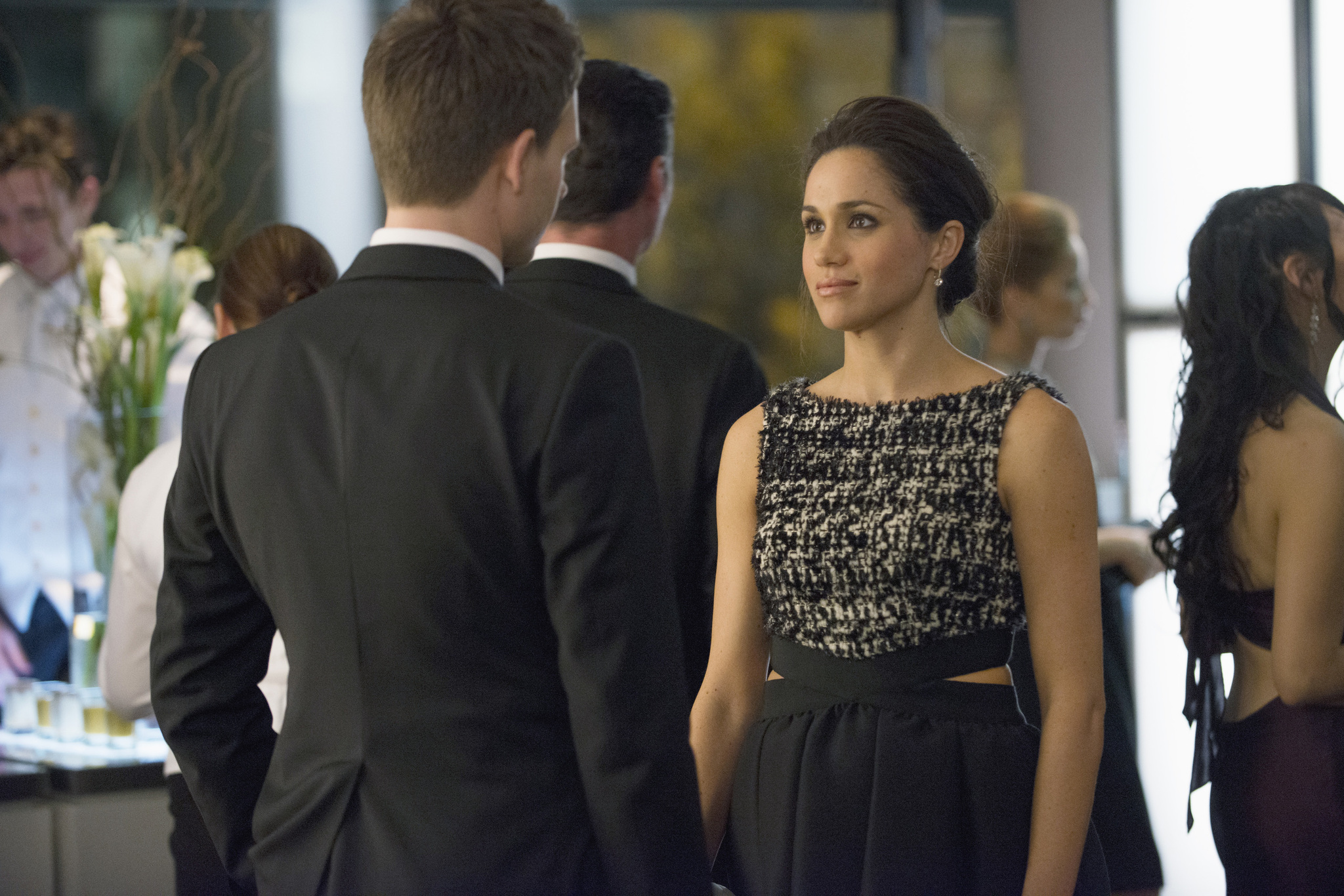 Patrick J. Adams and Meghan Markle in Suits (2011)