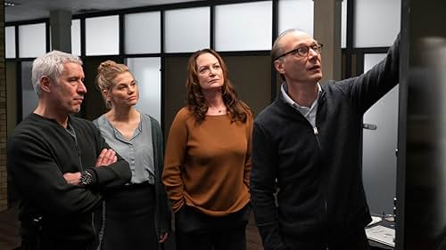 Martin Brambach, Ralph Herforth, Lisa Werlinder, and Natalia Wörner in Mütter und Söhne (2023)