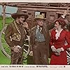 Lynn Bari, Warner Baxter, and Henry Hull in The Return of the Cisco Kid (1939)