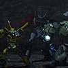 Peter Cullen and Kevin Michael Richardson in Transformers Prime (2010)