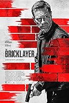 Aaron Eckhart and Nina Dobrev in The Bricklayer (2023)