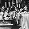 Whitney Houston and Courtney B. Vance in The Preacher's Wife (1996)