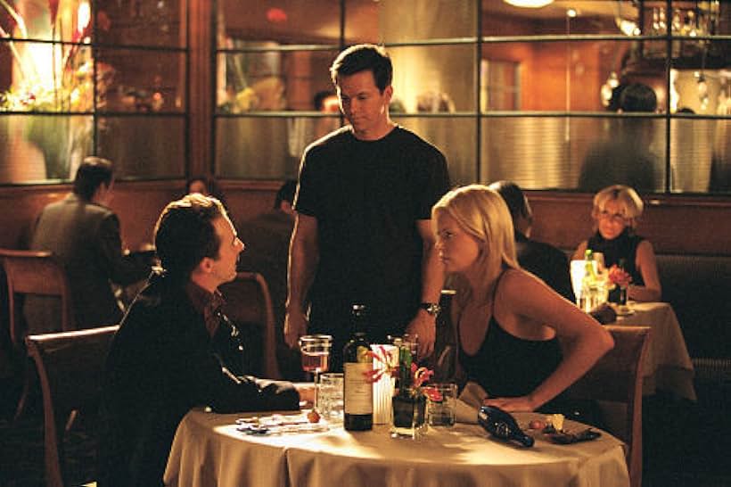 Charlize Theron, Mark Wahlberg, and Edward Norton in The Italian Job (2003)