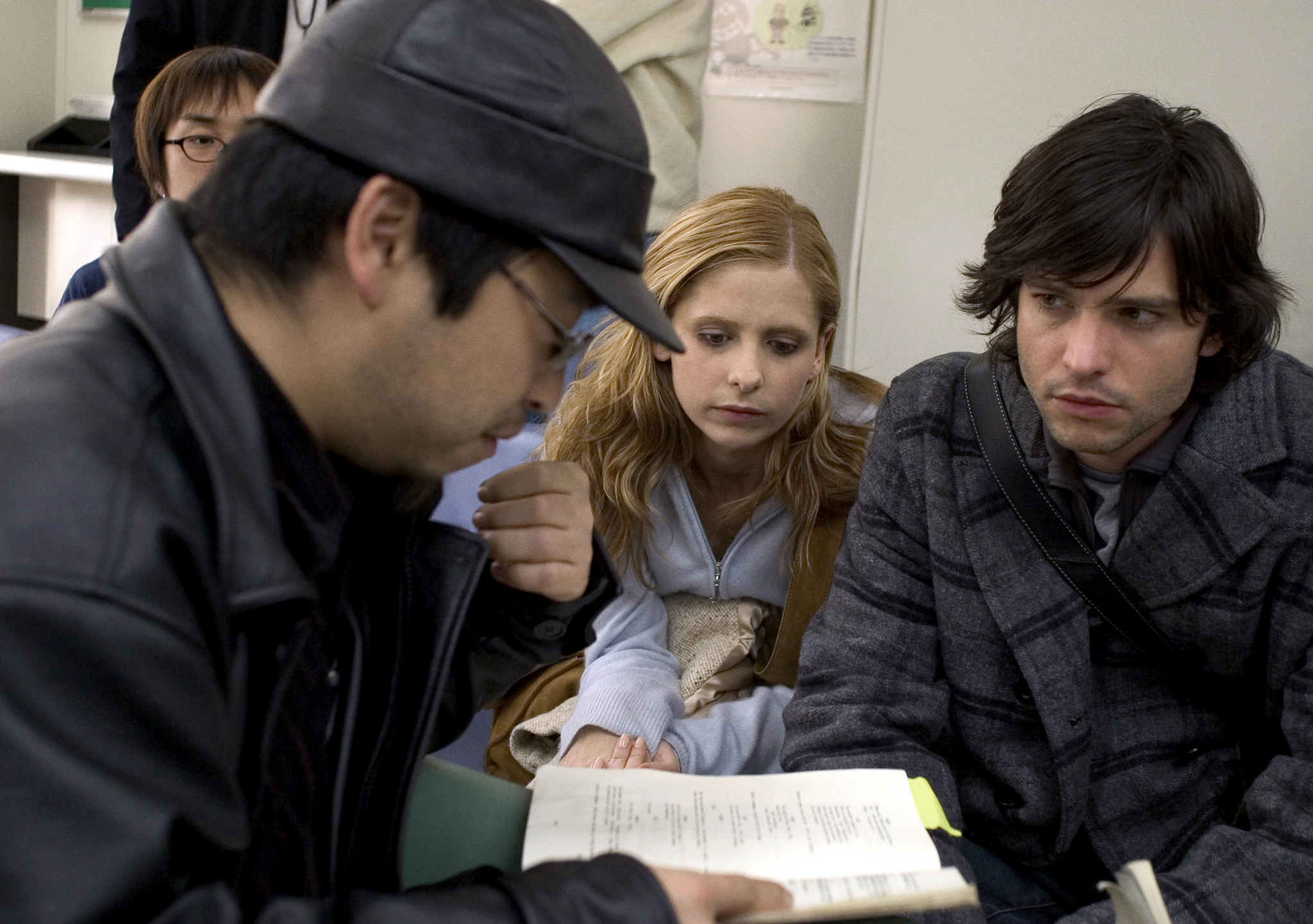 Sarah Michelle Gellar, Jason Behr, and Takashi Shimizu in The Grudge (2004)