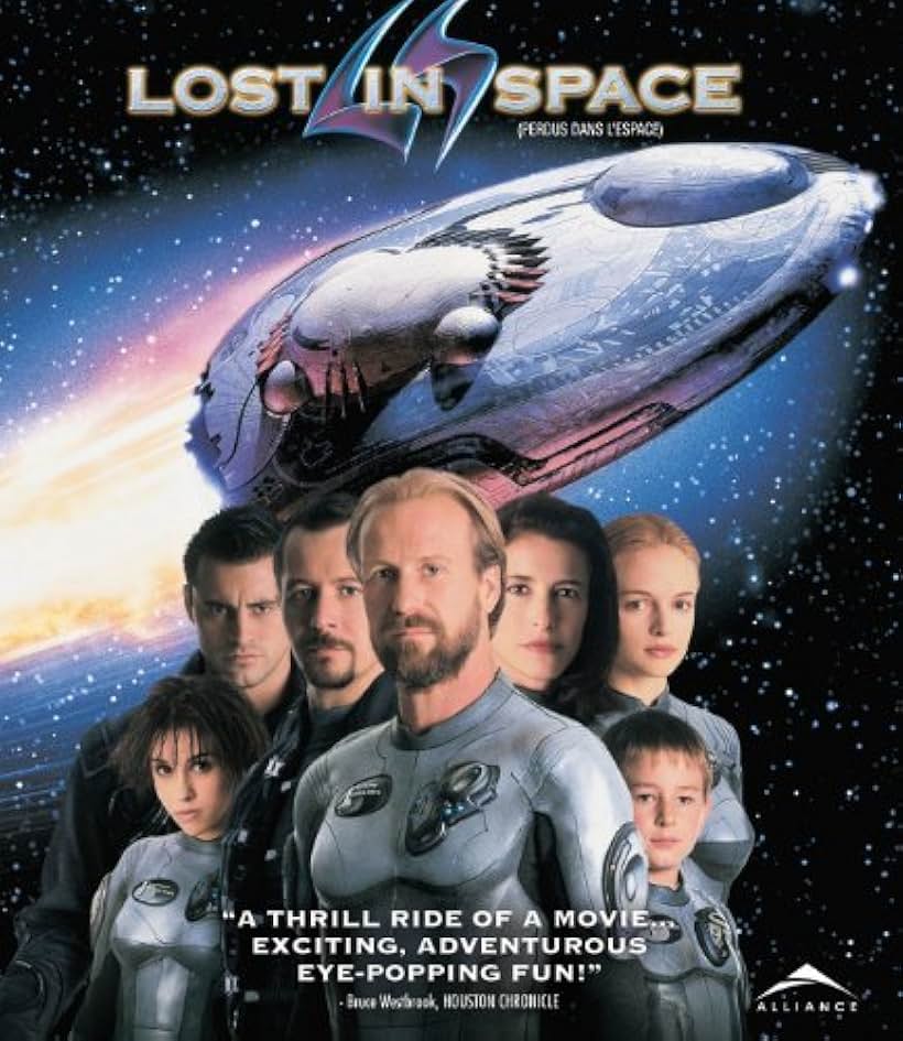 Gary Oldman, Mimi Rogers, Lacey Chabert, William Hurt, Heather Graham, Matt LeBlanc, and Jack Johnson in Lost in Space (1998)