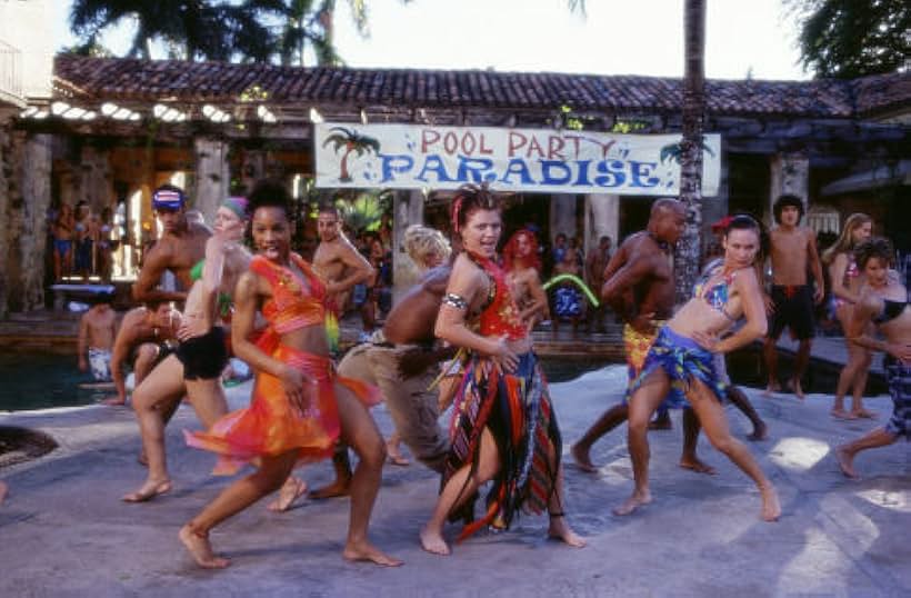 Kaya (Anika Noni Rose, left) and Kelly (Kelly Clarkson) sing and dance to "Pool Party Madness."(Background dancers: Leo Moctezuma, Kristin Denehy, Gilbert Salvidar, Nancy Anderson, Dondraico Johnson, Teresa Espinosa, Travis Payne, Stacy Walker).