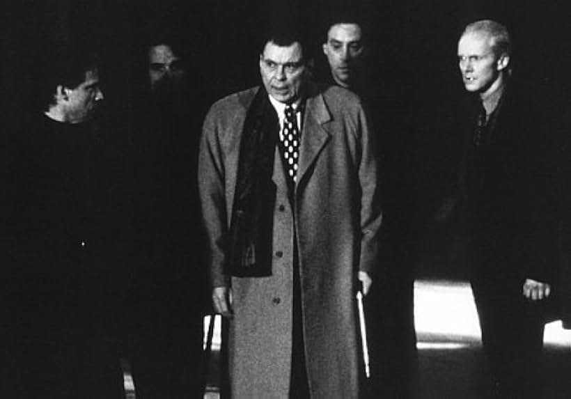 With his gang, ruthless crimelord Robert G. Durant (Larry Drake, center) prepares to launch a merciless assault upon those who stand in his way.