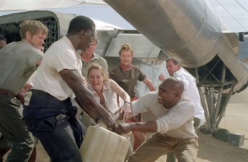 The surviving passengers of a downed plane lost in the Mongolian desert struggle for their most precious commodity: water.  Pictured, left to right are: Scott Michael Campbell as Liddle, Tyrese Gibson as AJ, Miranda Otto as Kelly, Dennis Quaid as Towns, Tony Curran as Rodney, Kirk Jones as Jeremy, and Hugh Laurie as Ian.