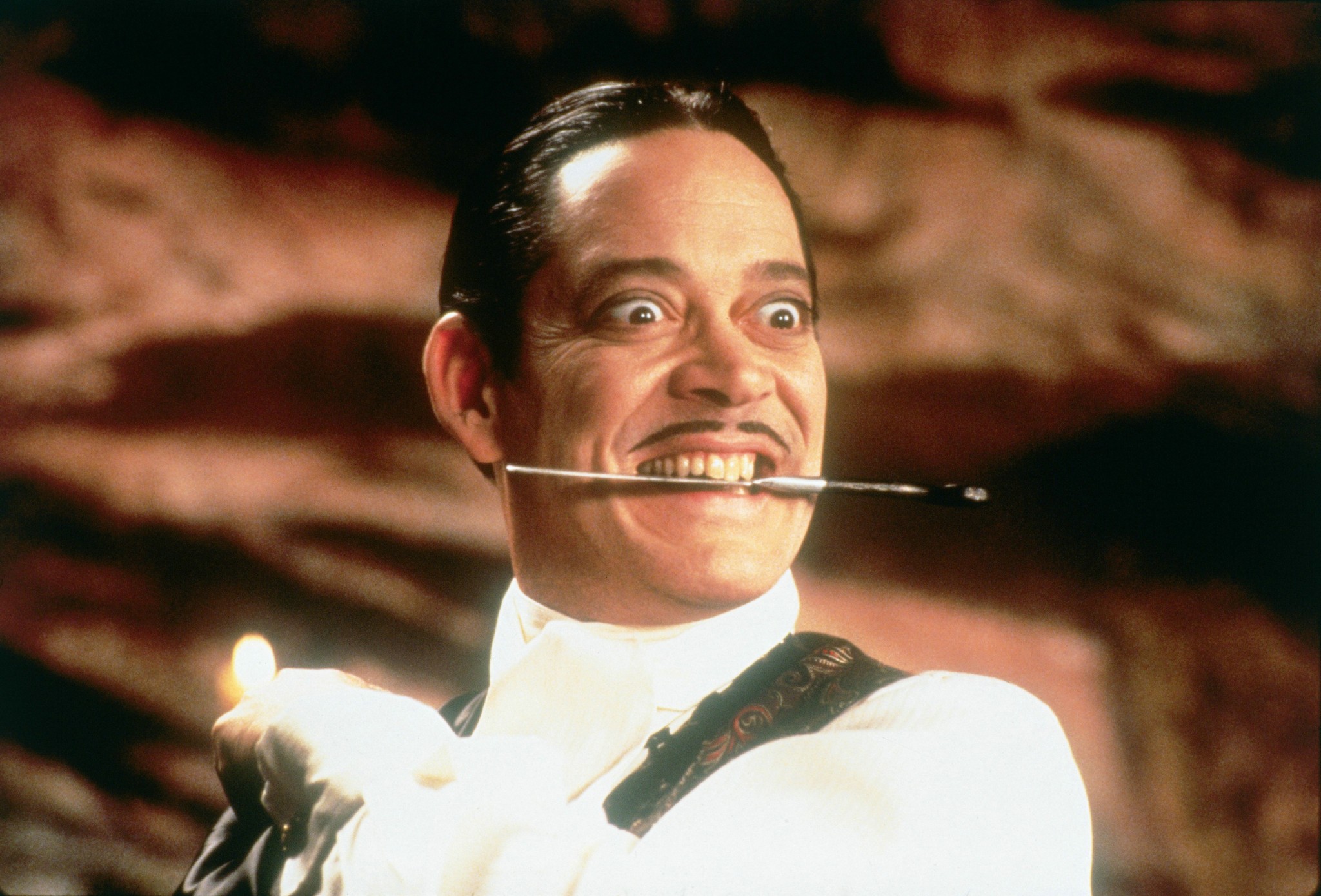 Raul Julia in Addams Family Values (1993)