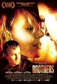 Connie Nielsen, Nikolaj Lie Kaas, and Ulrich Thomsen in Brothers (2004)