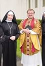 Beth Gargan, Barbara A. Fisher, John Richard Petersen and Rhoda Pell on the set of NUN FU