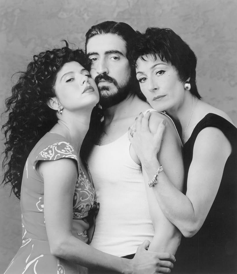 Alfred Molina, Marisa Tomei, and Anjelica Huston in The Perez Family (1995)