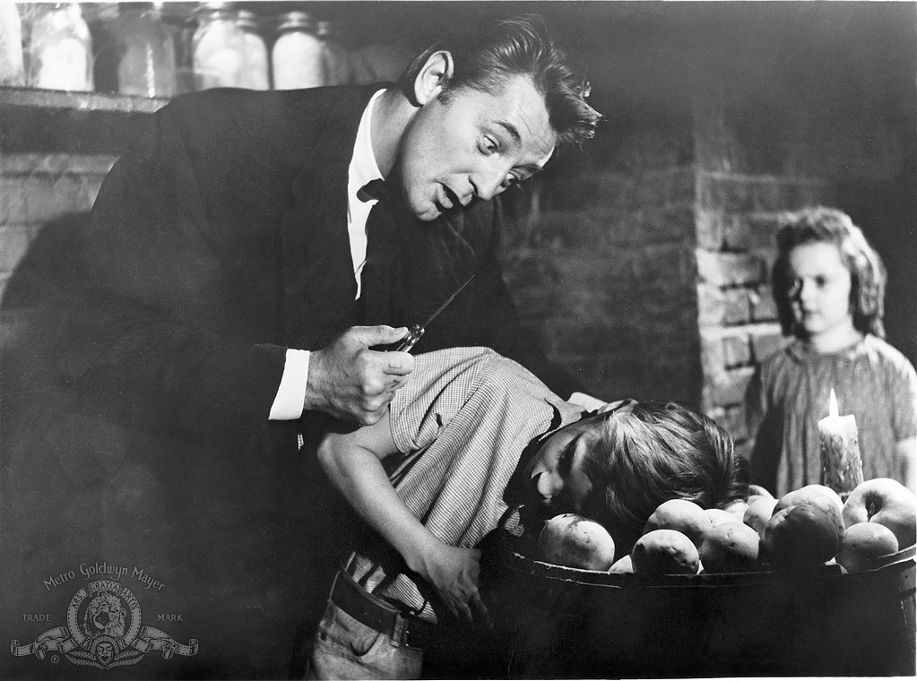 Robert Mitchum, Sally Jane Bruce, and Billy Chapin in The Night of the Hunter (1955)