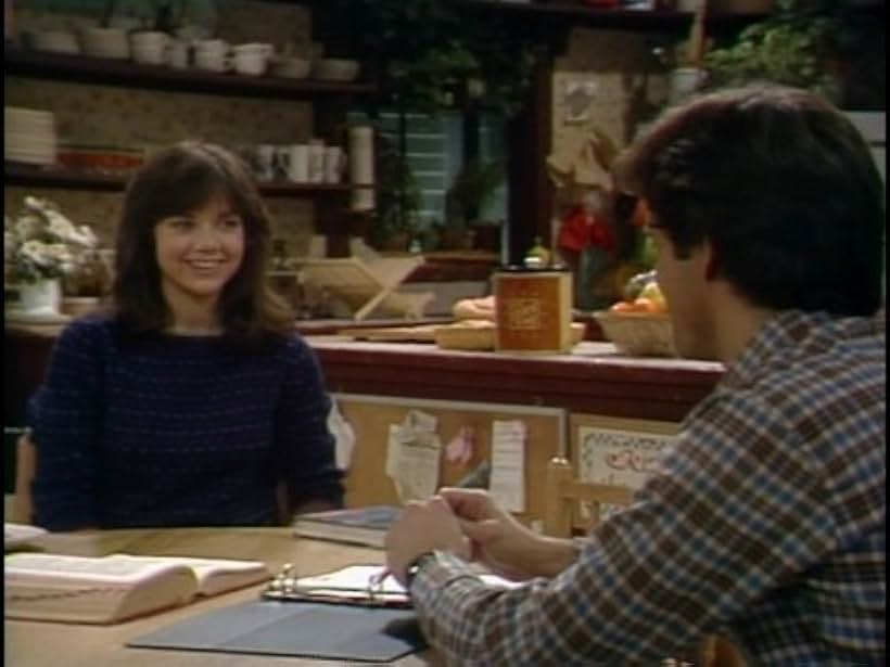 Justine Bateman and John Dukakis in Family Ties (1982)