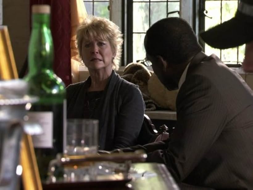 James McDaniel and Dee Wallace in Detroit 1-8-7 (2010)