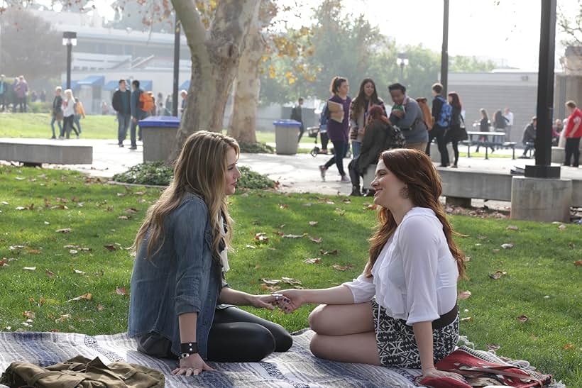 Katie Stevens and Rita Volk in Faking It (2014)