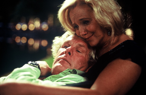 Sally Kirkland and Nick Nolte in Off the Black (2006)