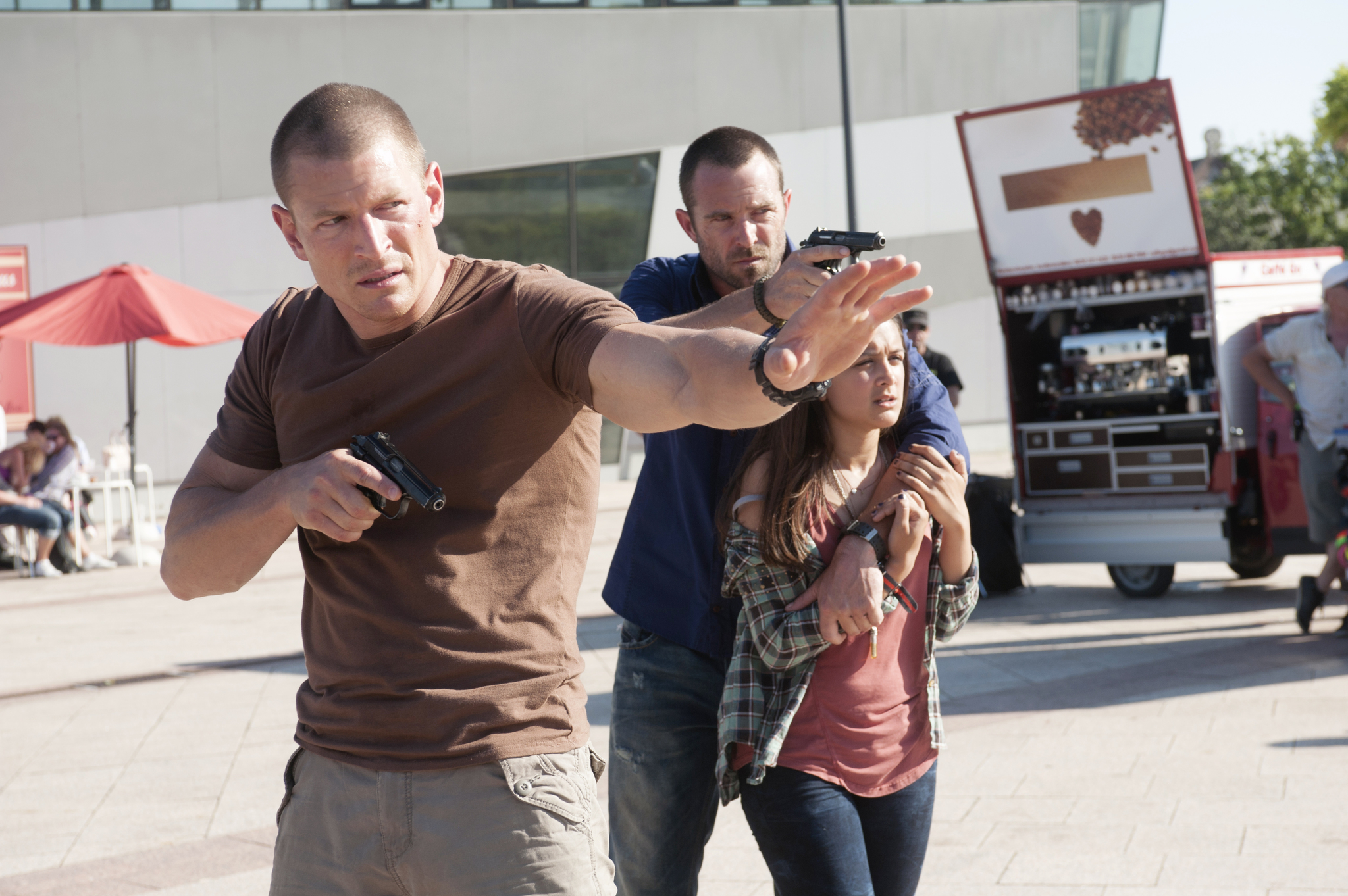 Sullivan Stapleton, Philip Winchester, and Amy-Leigh Hickman in Strike Back (2010)