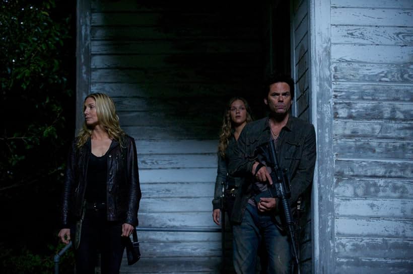 Billy Burke, Elizabeth Mitchell, and Tracy Spiridakos in Revolution (2012)