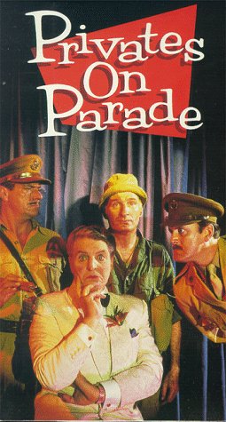 John Cleese, Michael Elphick, Joe Melia, and Denis Quilley in Privates on Parade (1983)