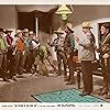 Cesar Romero, Robert Barrat, Warner Baxter, C. Henry Gordon, Chris-Pin Martin, Adrian Morris, and Harry Strang in The Return of the Cisco Kid (1939)