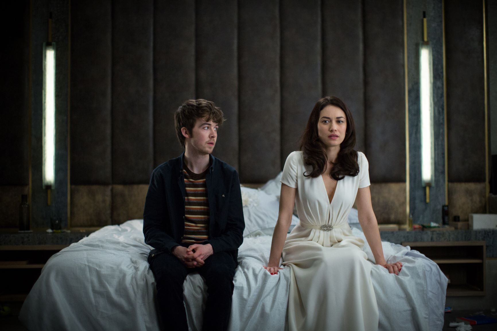 Olga Kurylenko and Alex Lawther in The Translators (2019)