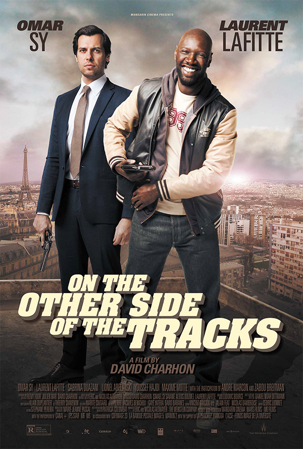 Laurent Lafitte and Omar Sy in On the Other Side of the Tracks (2012)