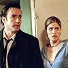 John Cusack and Amanda Peet in Identity (2003)