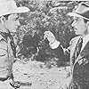 Roy Rogers and Bradley Page in Sons of the Pioneers (1942)