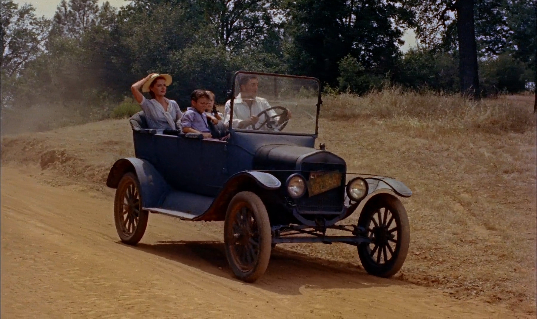 Steve Cochran, Richard Eyer, Sherry Jackson, and Ann Sheridan in Come Next Spring (1956)