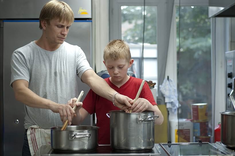 Jérémie Renier and Thomas Doret in The Kid with a Bike (2011)