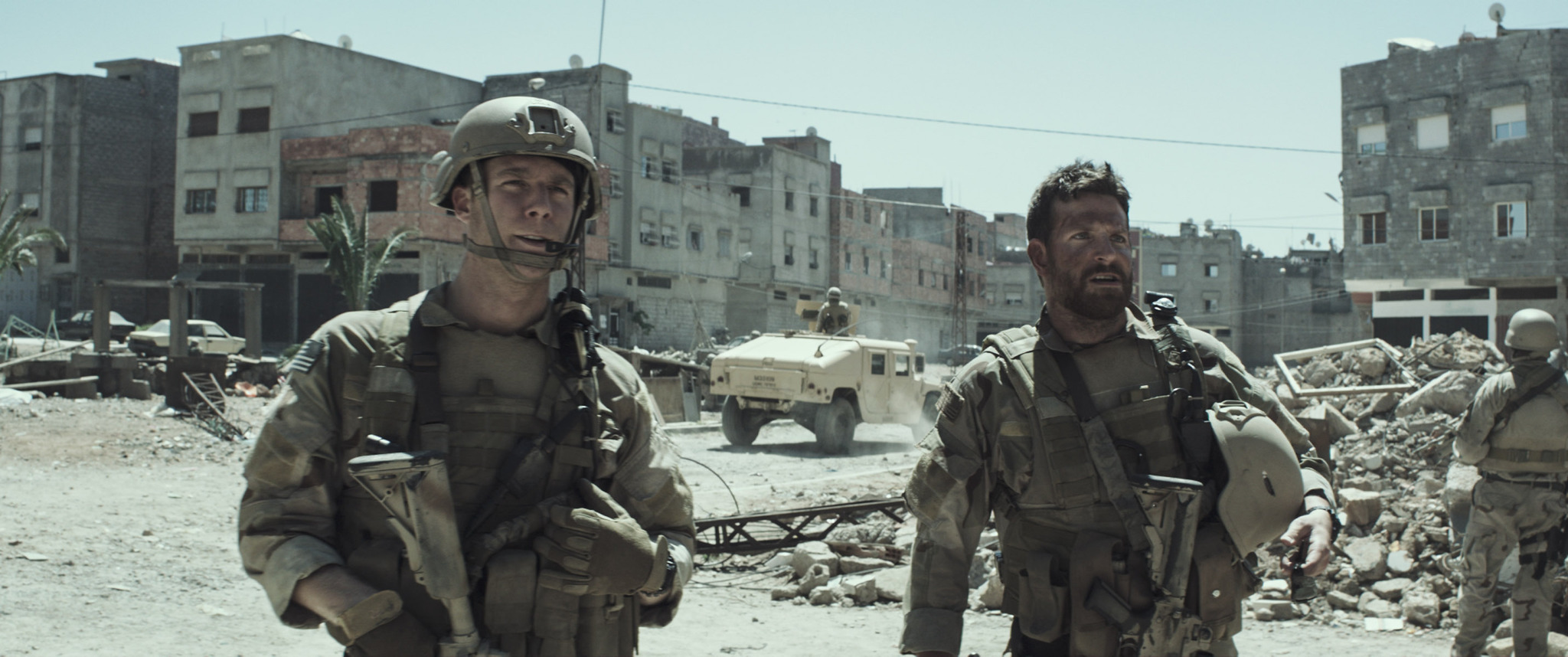 Bradley Cooper and Jake McDorman in American Sniper (2014)