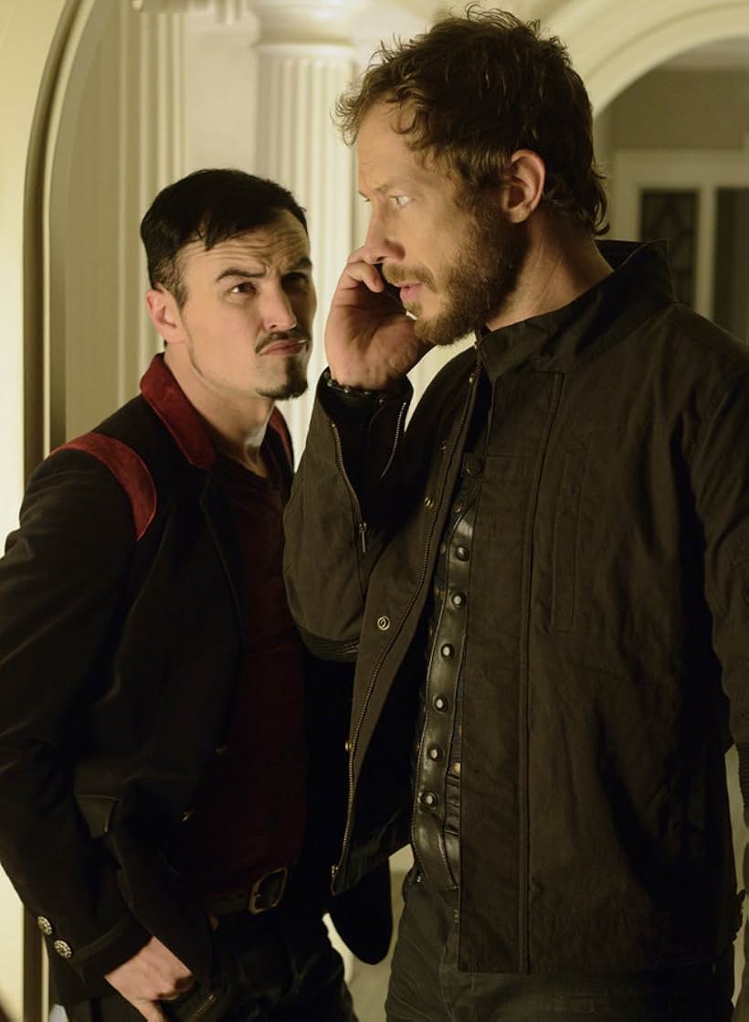 Kris Holden-Ried and Paul Amos in Lost Girl (2010)