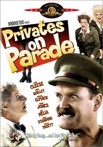 John Cleese, Bruce Payne, and Denis Quilley in Privates on Parade (1983)