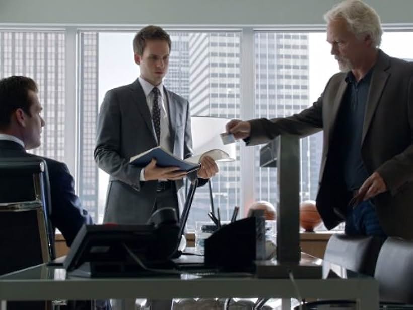 Gabriel Macht, James Morrison, and Patrick J. Adams in Suits (2011)