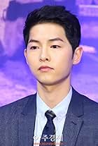 Song Joong-ki at an event for Descendants of the Sun (2016)