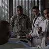 Sharif Atkins, Arlen Escarpeta, Peter Jacobson, and Jesse Spencer in House M.D. (2004)