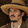 John Leguizamo as Lorenzo Daza