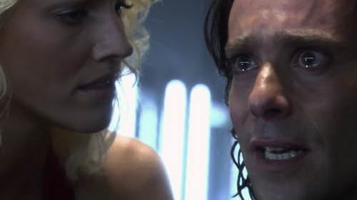 James Callis and Tricia Helfer in Battlestar Galactica (2004)