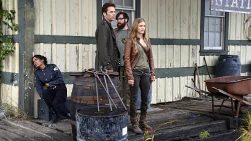 Daniella Alonso, Billy Burke, Zak Orth, and Tracy Spiridakos in Revolution (2012)