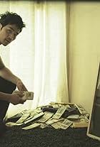 Kim Kang-woo in The Taste of Money (2012)