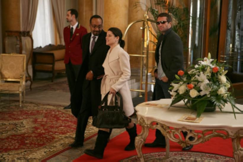 Neve Campbell, Jesse L. Martin, and James Purefoy in The Philanthropist (2009)